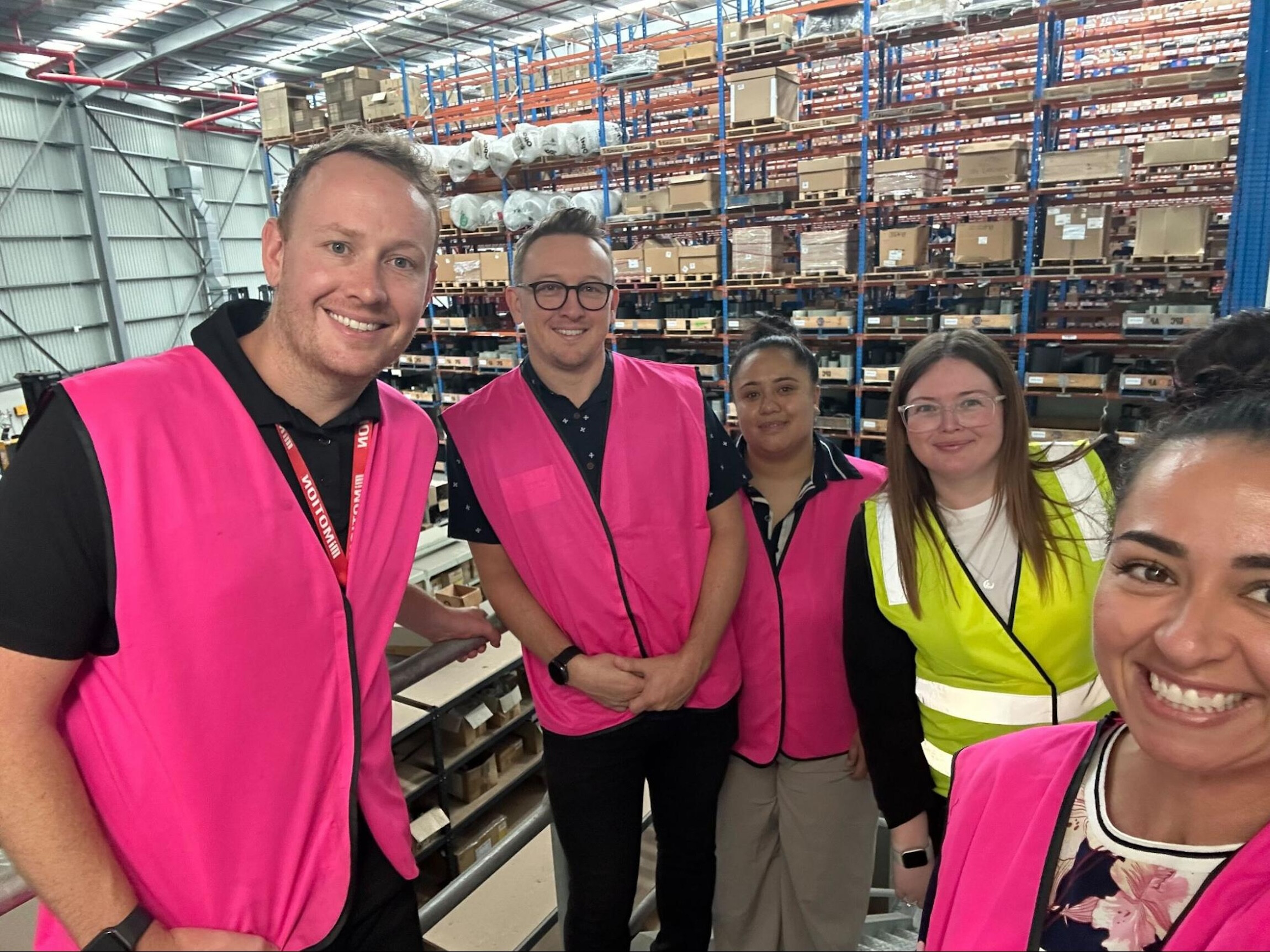 Sophie Stefanetti and Ben Davis meeting with customer Motion Industries in their Sydney warehouse.